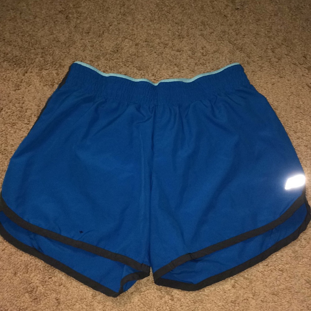 Small blue New Balance shorts.